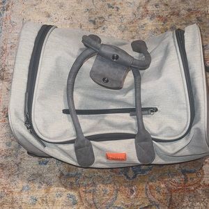 Gray travel stitch travel bag. Roller or duffel